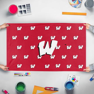A mockup of the custom flag 'WArrior W Red/white flag' held up on a table during print checking