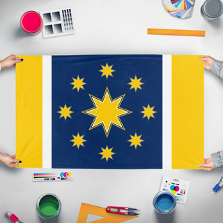 A mockup of the custom flag 'Union flag' held up on a table during print checking