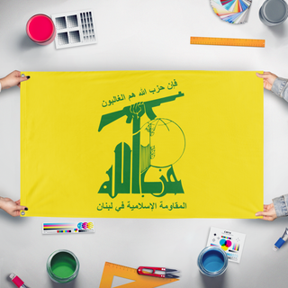 A mockup of the custom flag 'Hezbollah flag' held up on a table during print checking