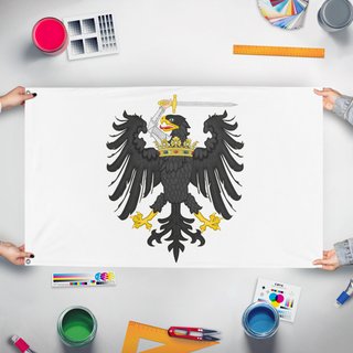 A mockup of the custom flag 'Redesigned Royal Prussia  flag' held up on a table during print checking