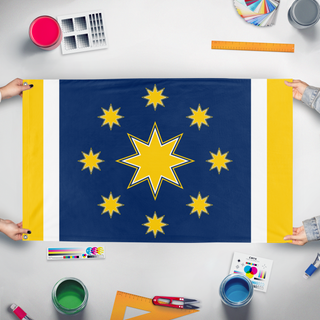 A mockup of the custom flag 'Union flag' held up on a table during print checking