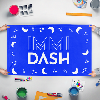 A mockup of the custom flag 'Immi Dash Final flag' held up on a table during print checking