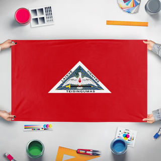 A mockup of the custom flag 'Proposed flag of the Russian Republic' held up on a table during print checking