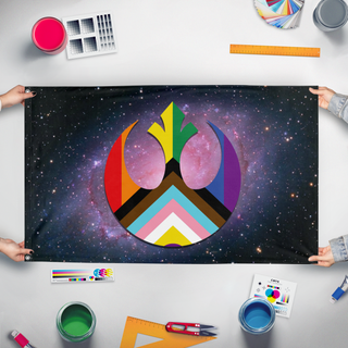 A mockup of the custom flag 'Star Wars Rebel Pride flag' held up on a table during print checking