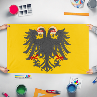A mockup of the custom flag 'H.R.E Redesign  flag' held up on a table during print checking