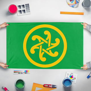 A mockup of the custom flag 'Pan-Celticism flag' held up on a table during print checking
