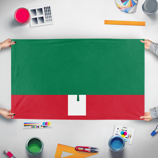 A mockup of the custom flag 'Democratic Republic of Maine flag' held up on a table during print checking