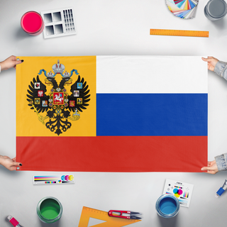 A mockup of the custom flag 'Imperial Russian WWI flag' held up on a table during print checking