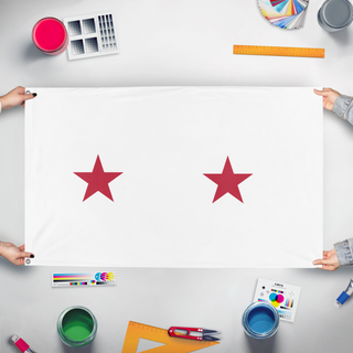 A mockup of the custom flag 'Tag Test flag' held up on a table during print checking