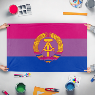 A mockup of the custom flag 'BDR Flag' held up on a table during print checking