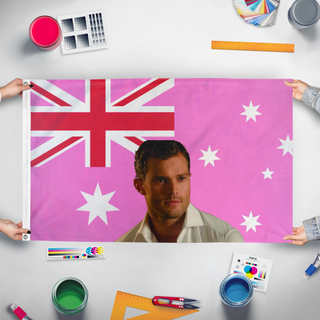 A mockup of the custom flag 'aussie flag' held up on a table during print checking