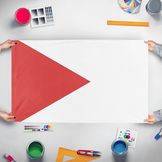 A mockup of the custom flag 'test flag' held up on a table during print checking