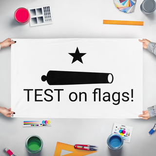 A mockup of the custom flag 'test flag' held up on a table during print checking