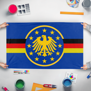 A mockup of the custom flag 'Germany' held up on a table during print checking