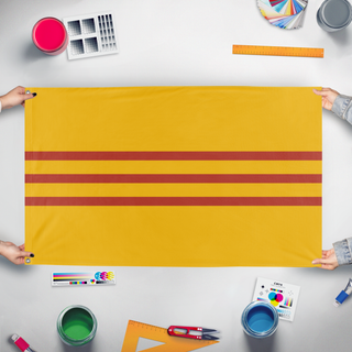 A mockup of the custom flag 'S flag' held up on a table during print checking