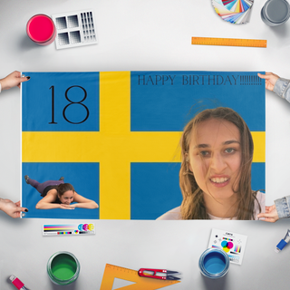 A mockup of the custom flag 'Luisaa flag' held up on a table during print checking
