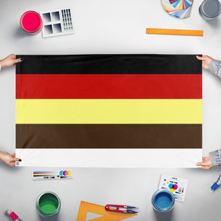 A mockup of the custom flag 'Rainbow Coalition flag' held up on a table during print checking