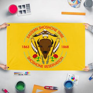 A mockup of the custom flag 'eastern shoshone tribe flag' held up on a table during print checking