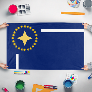 A mockup of the custom flag 'Aurelion flag' held up on a table during print checking