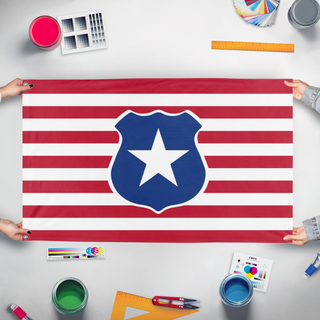 A mockup of the custom flag 'Flag of Columbia' held up on a table during print checking