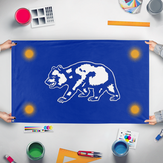 A mockup of the custom flag 'C flag' held up on a table during print checking