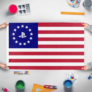 A mockup of the custom flag 'Great Playstation flag' held up on a table during print checking