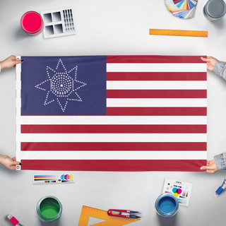 A mockup of the custom flag 'Greatest Blossum flag' held up on a table during print checking