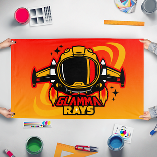 A mockup of the custom flag 'rays flag' held up on a table during print checking