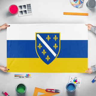 A mockup of the custom flag 'Bosnia and Hercegovina Flag Redesign' held up on a table during print checking