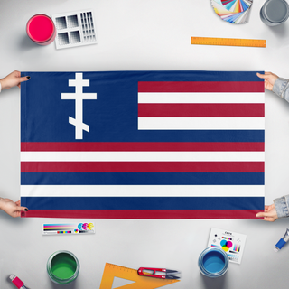 A mockup of the custom flag 'Serapis Orthodox flag' held up on a table during print checking