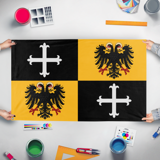 A mockup of the custom flag 'H.R.E Quarter Style  flag' held up on a table during print checking