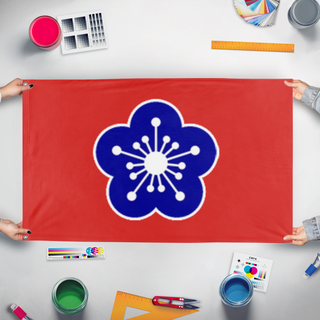 A mockup of the custom flag 'Guangzhou Government Civil War Flag' held up on a table during print checking