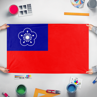 A mockup of the custom flag 'Guangzhou Government Republic Flag' held up on a table during print checking