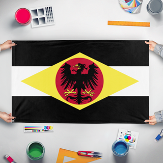 A mockup of the custom flag 'Ratufi flag' held up on a table during print checking