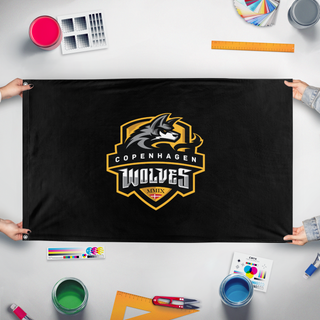 A mockup of the custom flag 'wlvs flag' held up on a table during print checking