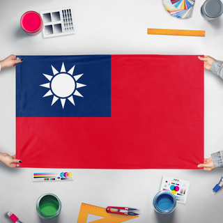 A mockup of the custom flag 'Republic of China' held up on a table during print checking