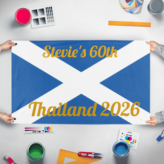 A mockup of the custom flag 'Stevie's 60th flag' held up on a table during print checking