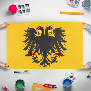 A mockup of the custom flag 'H.R.E HD flag' held up on a table during print checking