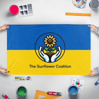 A mockup of the custom flag 'The Sunflower Coalition flag' held up on a table during print checking