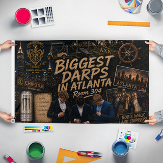 A mockup of the custom flag 'Biggest Darps in Atlanta flag' held up on a table during print checking