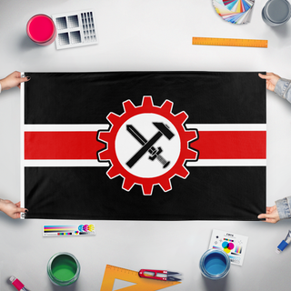 A mockup of the custom flag 'strass flag' held up on a table during print checking