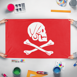 A mockup of the custom flag 'Henry Thew Pirate flag' held up on a table during print checking