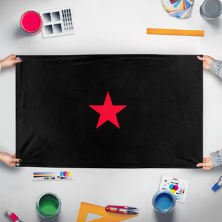 A mockup of the custom flag 'AFP flag' held up on a table during print checking