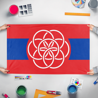A mockup of the custom flag 'Red Earth flag' held up on a table during print checking