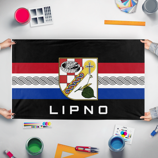 A mockup of the custom flag 'LIPNO flag' held up on a table during print checking