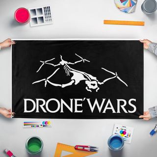 A mockup of the custom flag 'drone wars flag' held up on a table during print checking