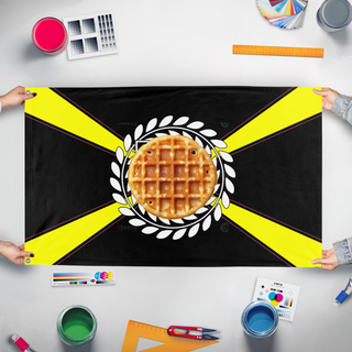 A mockup of the custom flag 'Adam Waffle Division flag' held up on a table during print checking