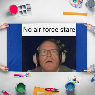 A mockup of the custom flag 'No Air Force flag' held up on a table during print checking