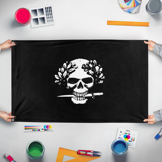 A mockup of the custom flag 'Arditi flag' held up on a table during print checking