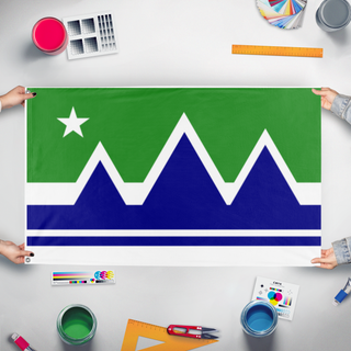 A mockup of the custom flag 'West Virginia flag redesign' held up on a table during print checking